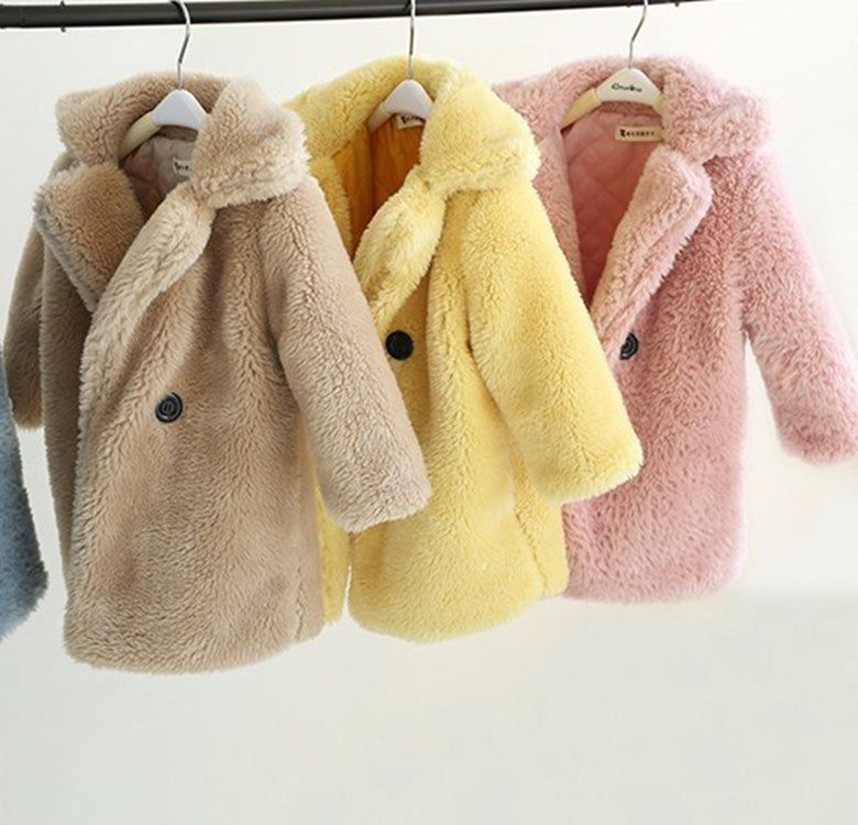 Kids Fur Coat displayed in three colors: beige, yellow, and pink, showcasing a warm and stylish design for children.