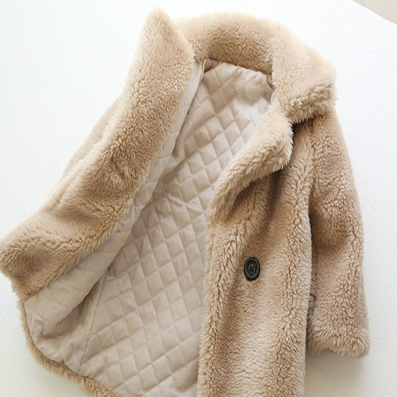Kids Fur Coat interior view showcasing soft faux fur and cozy lining for warmth in autumn and winter.